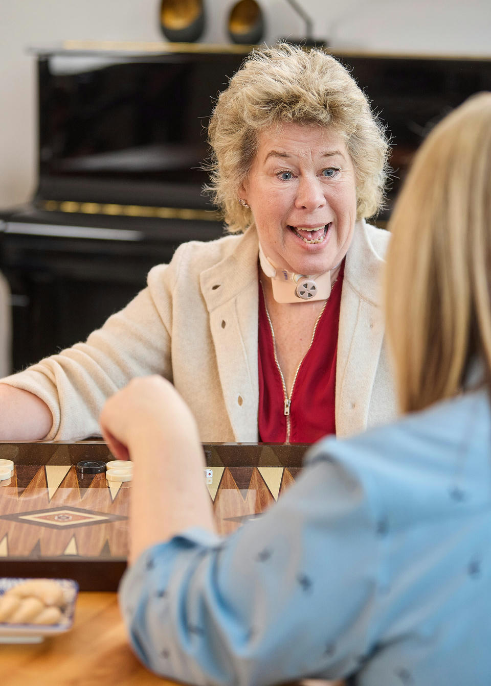 atos-medical-tracheostomy-patient-playing